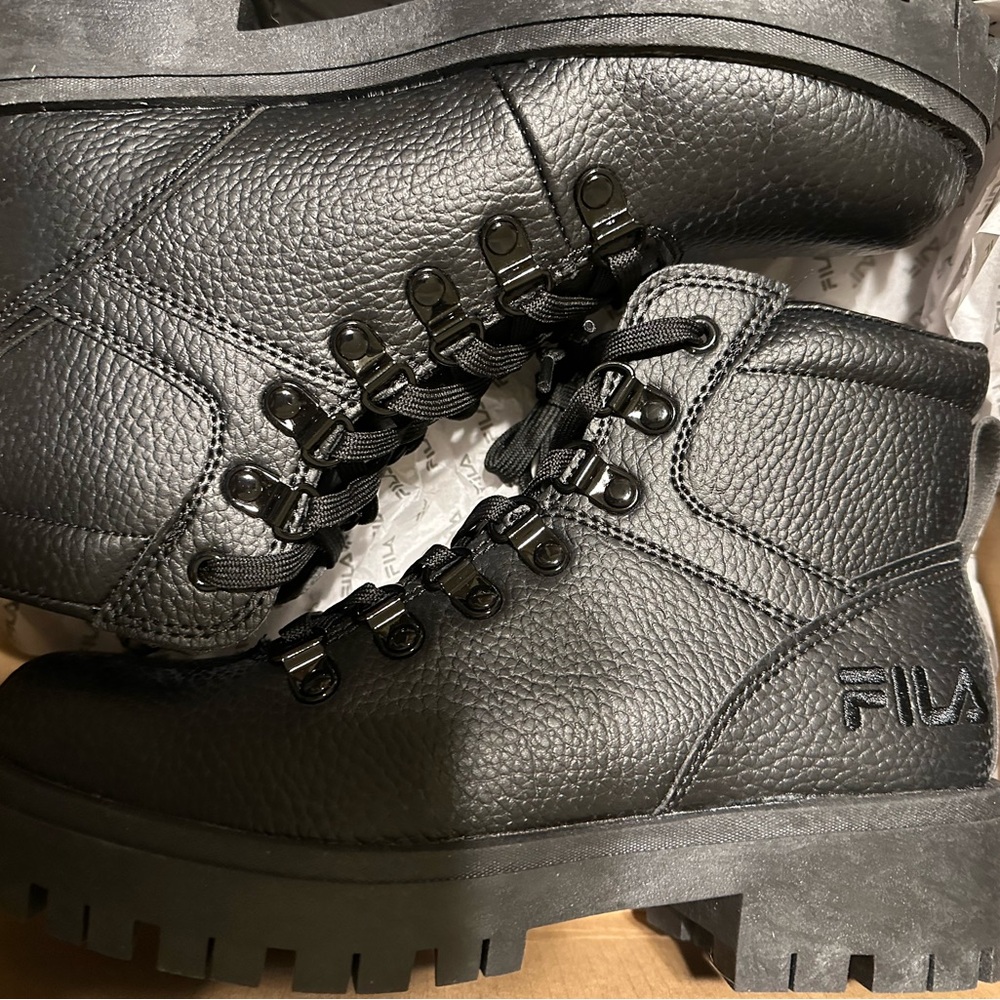 Fila Women's TY20 black synthetic lace-up boots.